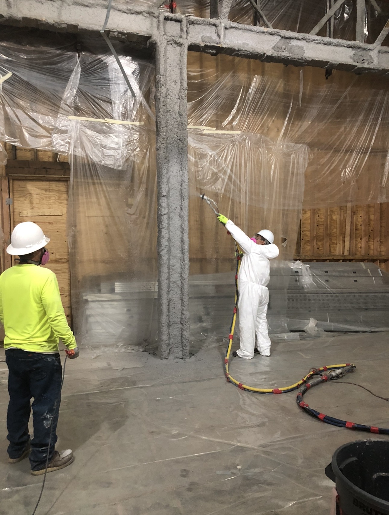 Cementitious fireproofing application on structural steel